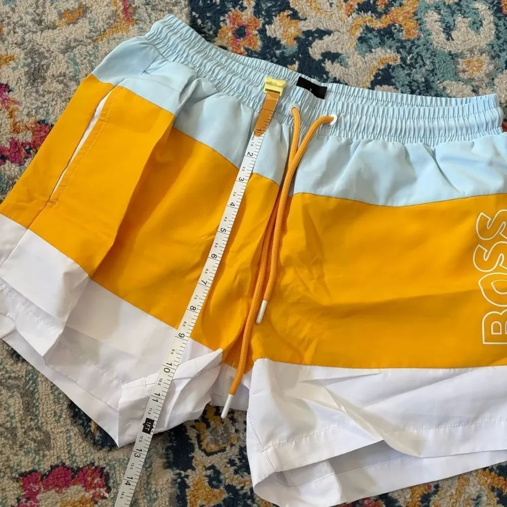 NEW HUGO BOSS men's coco swim shorts in open yellow Small